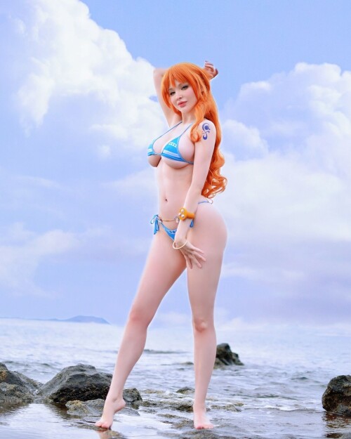 Check-out-these-gorgeous-shots-we-took-at-the-beach-of-my-Nami-cosplay-with-photo-action-by-mister_pecao-Now-I-clearly-see-why-the-author-designed-Nami-with-these-gorgeous-colors-it-treff07d49414e8457.jpg