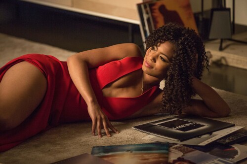 Anna Walsh (JAZ SINCLAIR) plays music in the living room to seduce John in Screen Gems WHEN THE BOUG