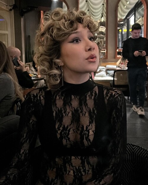 Photo-by-Gabrielle-Asrin-Bianchi-on-May-03-2024.-May-be-an-image-of-3-people-blonde-hair-makeup-turtleneck-and-fishnet-stockings.b50b3f8404d70051.jpg