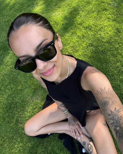 Photo-by-Pelinay-Igit-on-June-04-2024.-May-be-a-selfie-of-1-person-tattoo-eyewear-and-grass.86e5bc56f68074cf.jpg