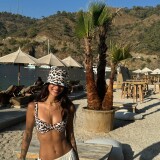 Photo-by-Pelinay-Igit-on-June-09-2024.-May-be-an-image-of-1-person-hat-sarong-headscarf-and-cabana.fbb6ab7c19d4c66c