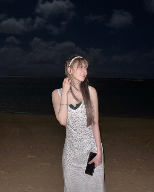 Photo-by-Sakura-Miyawaki-on-September-24-2024.-May-be-an-image-of-1-person-dress-sundress-beach-ocean-and-night5fc0ec344b2b8c14.jpg