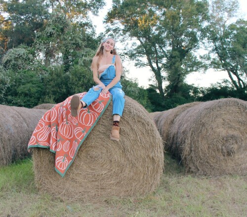 Photo by Siena Palicke on September 28, 2024. May be an image of 1 person, bandanna and grass.