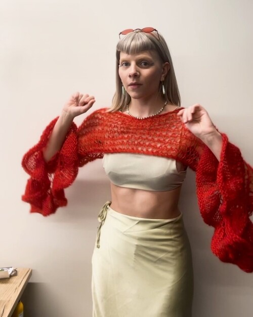 Photo shared by Amroth on September 07, 2024 tagging @auroramusic. May be an image of 1 person, fish