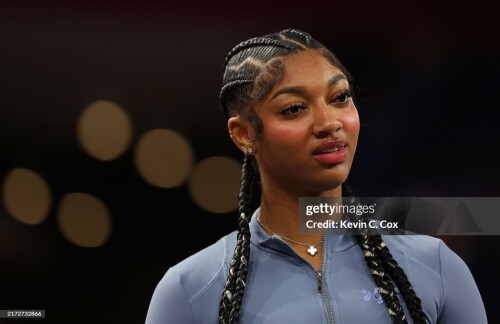 COLLEGE PARK, GEORGIA - SEPTEMBER 17:  Angel Reese #5 of the Chicago Sky reacts during player intros