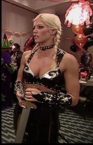 torrie-wilson-at-the-smackdown-halloween-party-2002-v0-p1lqxyo9e80d18f5db3fe4bf29916.webp